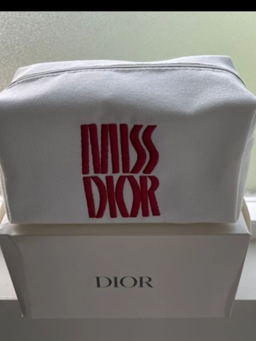 Dior compact canvas